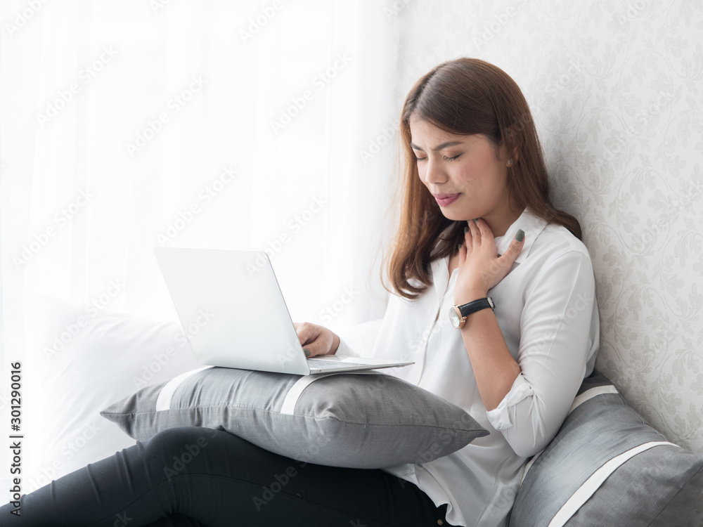 Asian woman in living room Asian woman in living room