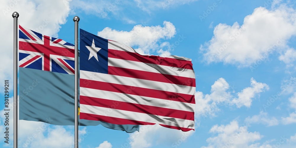 Tuvalu and Liberia flag waving in the wind against white cloudy blue sky together. Diplomacy concept, international relations. Tuvalu and Liberia flag waving in the wind against white cloudy blue sky together. Diplomacy concept, international relations.