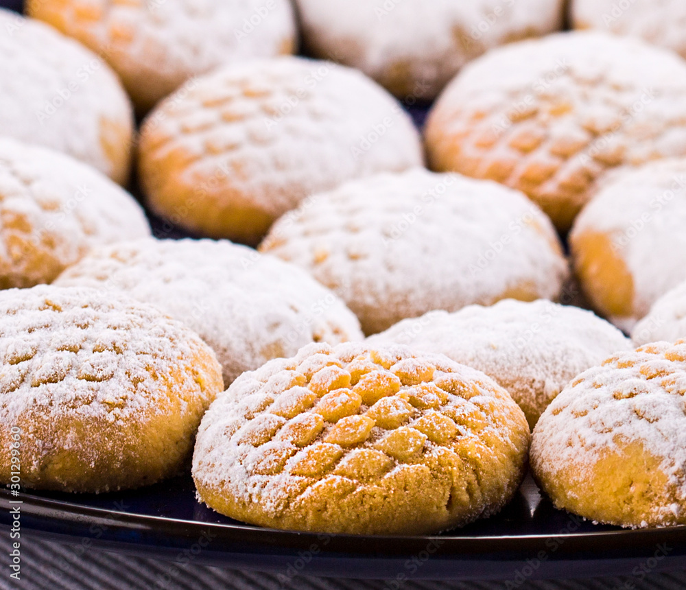 oriental shortbread cookies dusted with powder sugar 