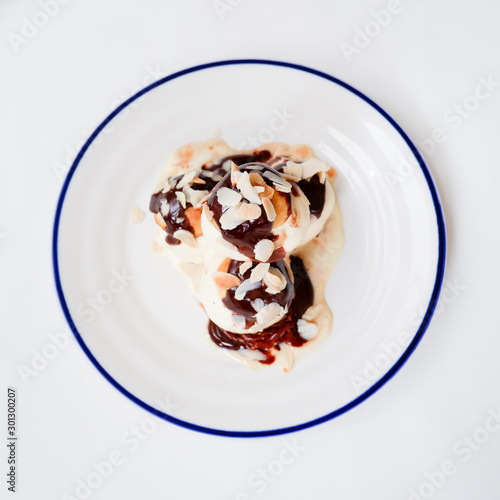 Choux pastry with vanilla ice cream and hot chocolate sauce