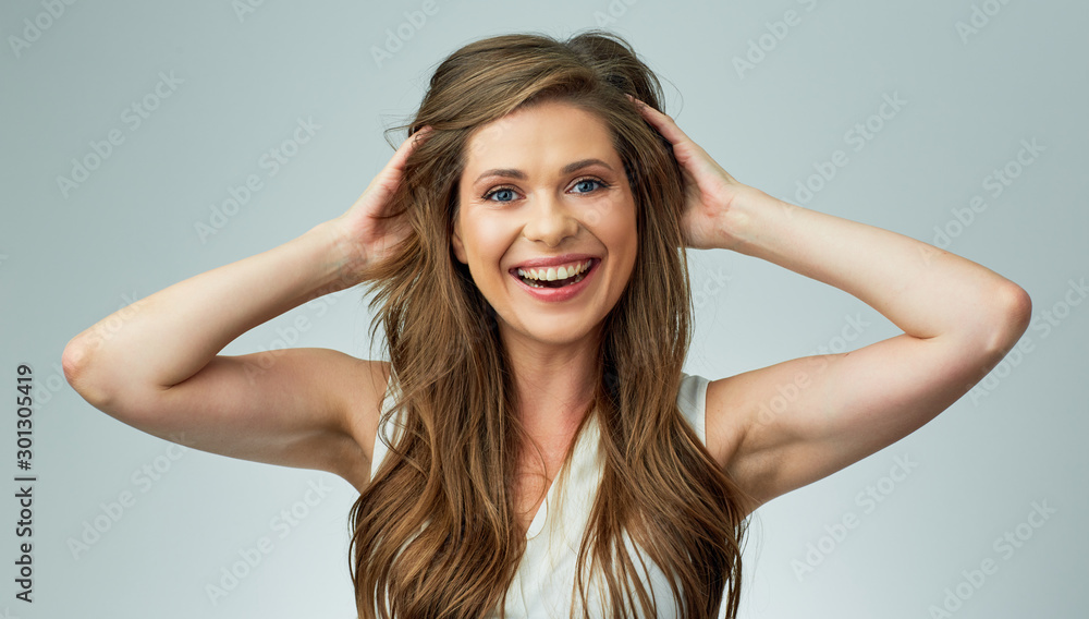 Beauty close up portrait of young smiling woman with long hair. Beauty close up portrait of young smiling woman with long hair.