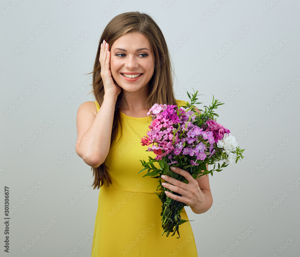 studio portrait of surprising woman with flowers. studio portrait of surprising woman with flowers.