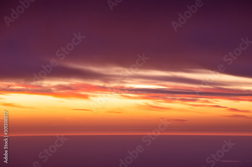 Aerial view of sunset and clouds in the sky.