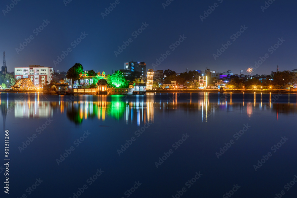 Seven Wonders Park on Kishore Sagar lake at night. Kota. India