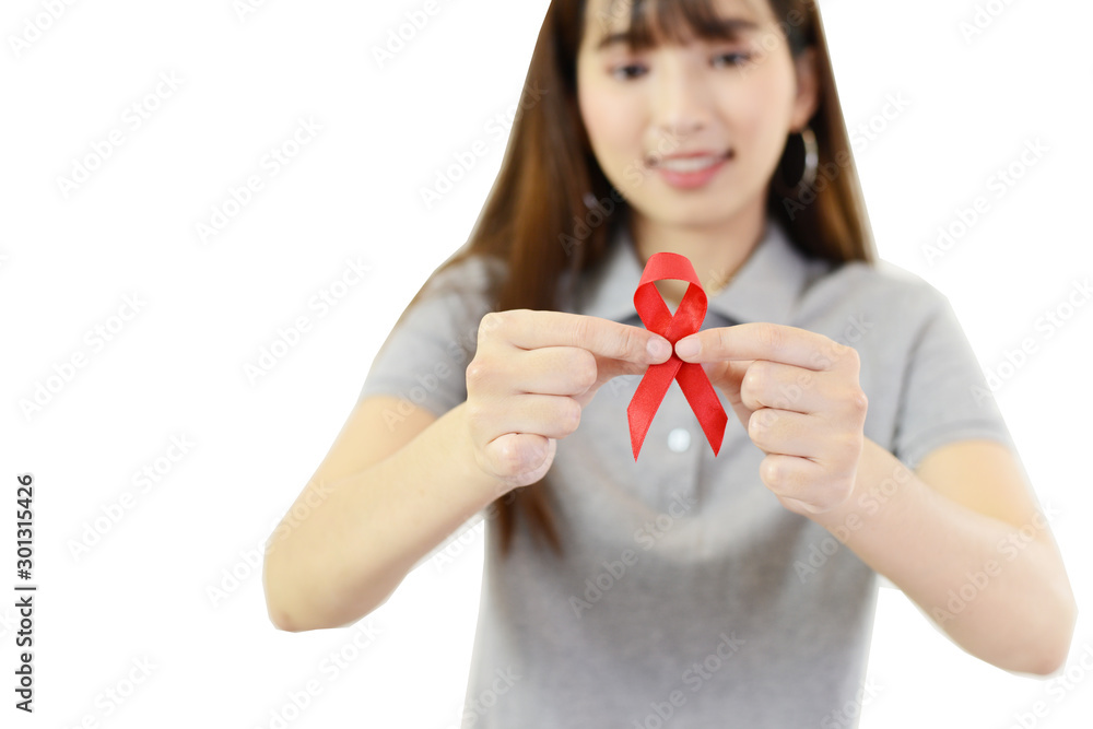 woman is holding red ribbon (Aids Symbol) on white isolated background woman is holding red ribbon (Aids Symbol) on white isolated background