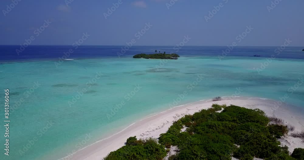 Overview of the Beautiful Tourist Island Destination With Blue Sky and Clean Water in Greece - Aerial shot Overview of the Beautiful Tourist Island Destination With Blue Sky and Clean Water in Greece - Aerial shot
