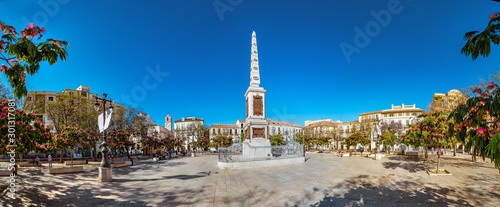 Panorama of the memorial obelisk dedicated to General Torrijos in Plaza de la Merced, popular square in the historic centre. photo