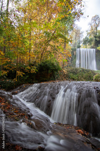 Fototapeta Naklejka Na Ścianę i Meble -  river with waterfall in the autumn season