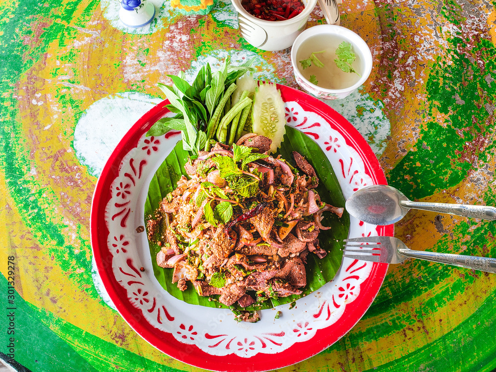 Thai food concept Street food on traditional "Spicy liver pork in