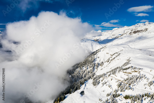 Clouds in the Swiss Alps in winter. Aletsch arena, Bettmeralp, Switzerland