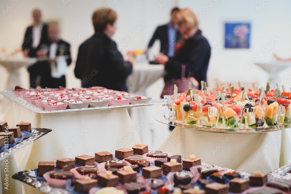 A collection of sweets on a plates during a reception. A collection of sweets on a plates during a reception.