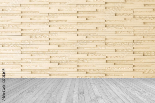Marble tile wall pattern  background in light cream beige color with wooden floor in grey tone