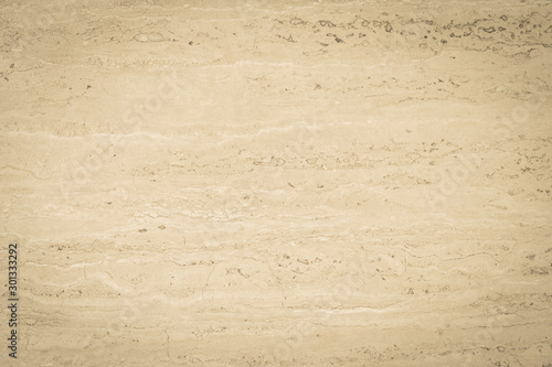 Marble limestone texture background in yellow cream tone