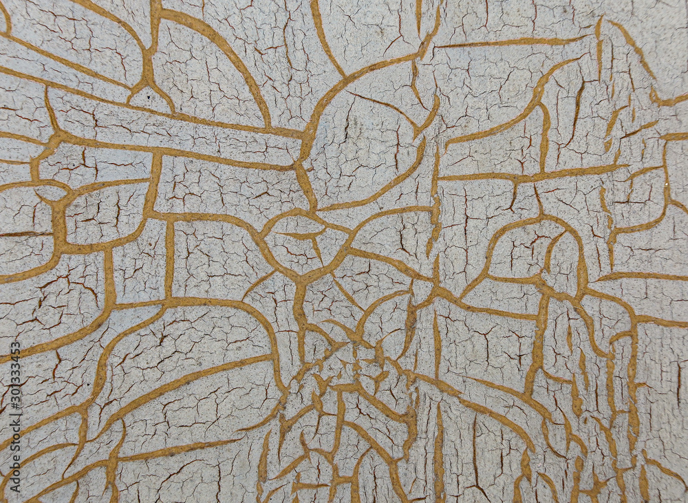 Obraz premium Cracked paint on wooden background, texture. Vintage wallpaper