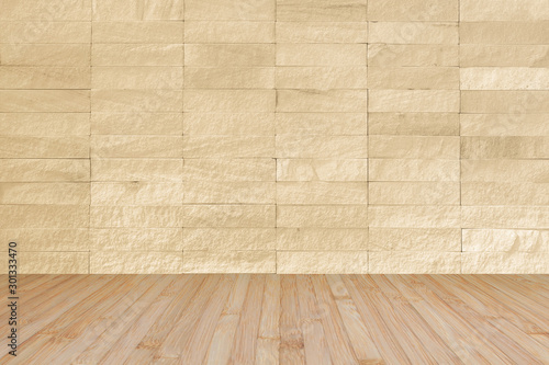 Rock tile wall with wooden floor in light sepia brown color for interior background