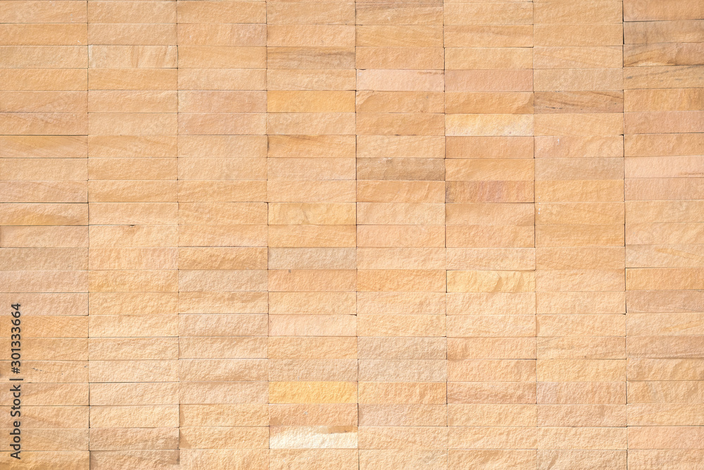 Rock tile wall texture background in natural cream brown beige Rock tile wall texture background in natural cream brown beige