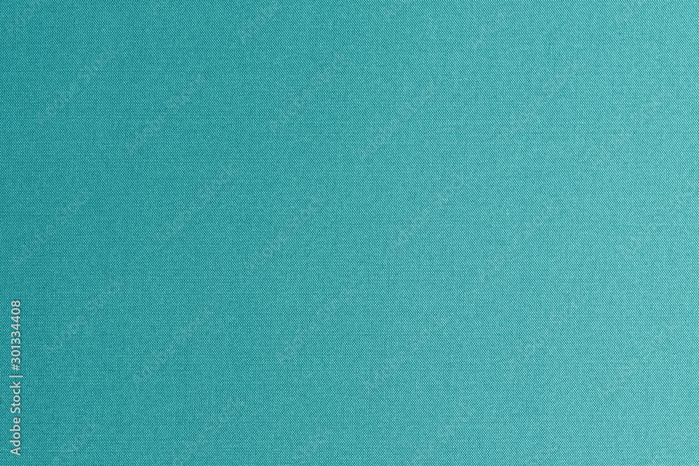 Fine authentic silk fabric texture pattern background in shiny dark true blue color Fine authentic silk fabric texture pattern background in shiny dark true blue color
