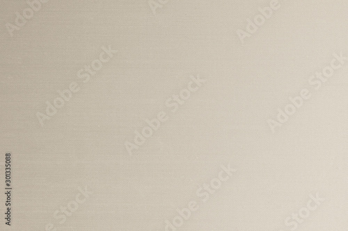 Silk fabric wallpaper texture pattern background in light pale cream beige color tone