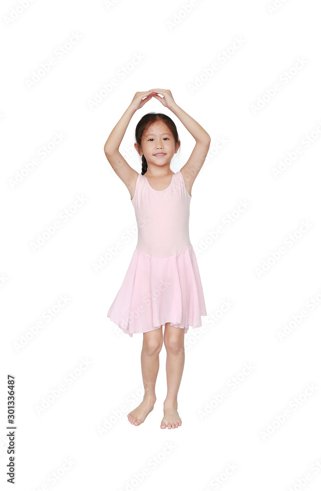 Beautiful little Asian child girl in pink tutu skirt dancing over white background. Children is studying ballet. Beautiful little Asian child girl in pink tutu skirt dancing over white background. Children is studying ballet.