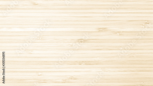 Fototapeta Naklejka Na Ścianę i Meble -  Bamboo natural wood texture pattern background in light cream beige brown color