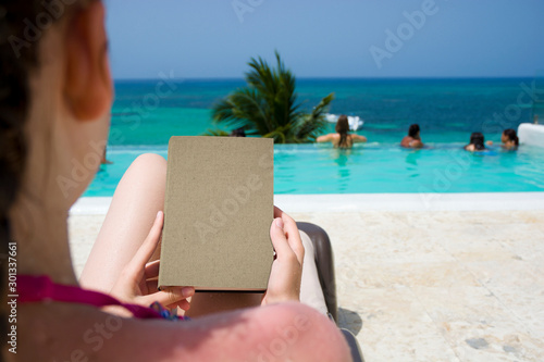 Young girl relaxing on loun...