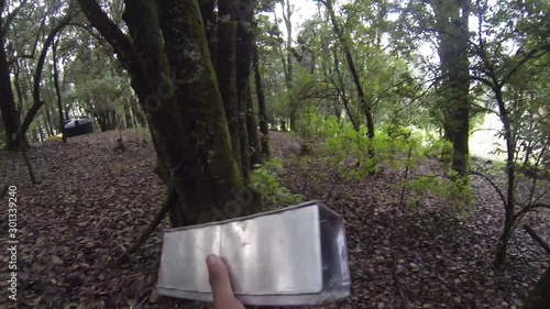 Close up of biologist setting up a Sherman trap photo