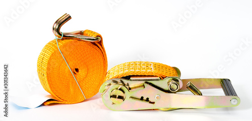 Ratchet straps for cargo load control. Cargo restraint strap