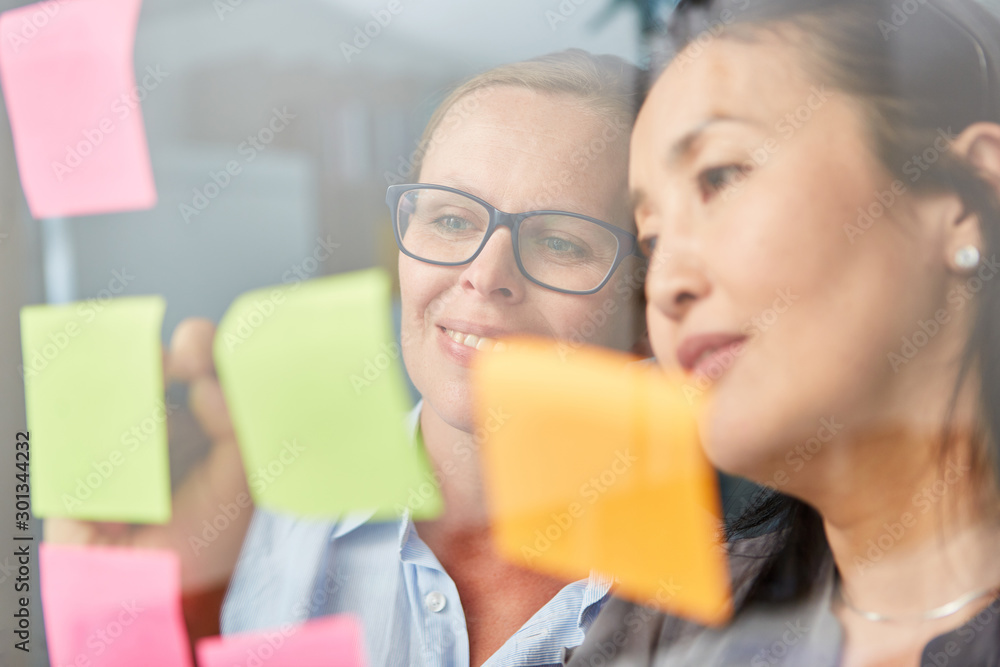 Business Women Analyze Ideas On Paper Stock Photo Adobe Stock business-women-analyze-ideas-on-paper-stock-photo-adobe-stock