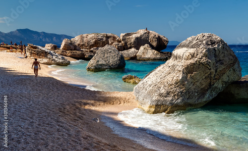 Cala Marilou beach near Arbatax, one of the most beautiful beaches on the East Coast of Sardinia with the rocks arching out of the water. Holidays, Sardinia, Italy.