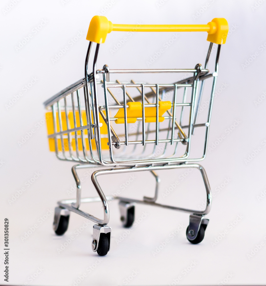 Shopping cart close-up. Isolated. Sales