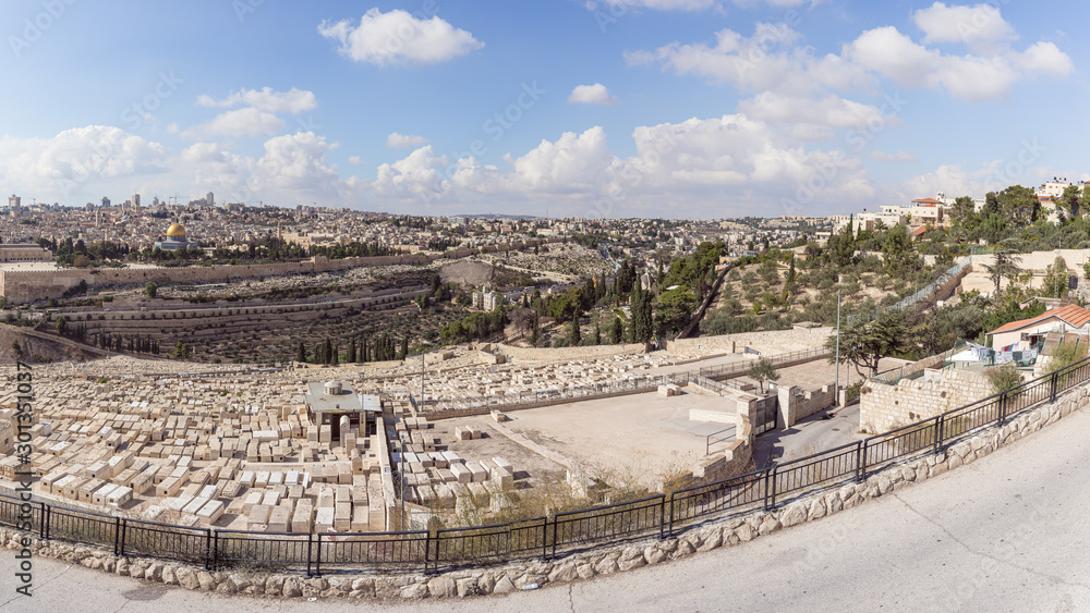Panoramic view of the Jewish cemetery, the Temple Mount, the old and modern city of Jerusalem from Mount Eleon - Mount of Olives in East Jerusalem in Israel