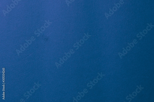 Color classic blue paper. Clean blue texture with simple surface. High resolution. Empty deep blue paper backgrounds.