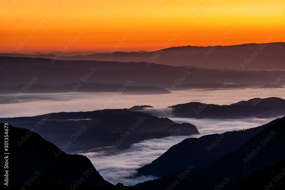 The julians alps mountain range during sunrise and sunset with the epic mountains and colour in Slovenia The julians alps mountain range during sunrise and sunset with the epic mountains and colour in Slovenia