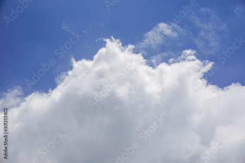 Beautiful blue sky background with clouds,Nature composition, Pure white clouds like cotton wool. © Jantra2018