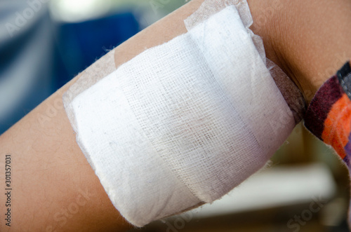 White bandage for First Aid Child 's Injuried photo