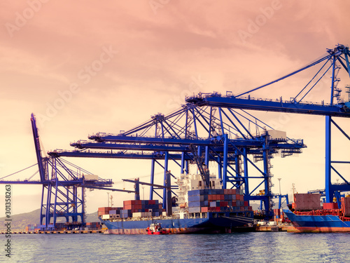 Container ship in the port of Algeciras, Spain loading and unloading containers