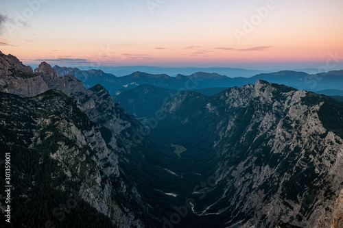 The julians alps mountain range during sunrise and sunset with the epic mountains and colour in Slovenia
