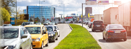 Photography Cars moving on the road in city in late evening
