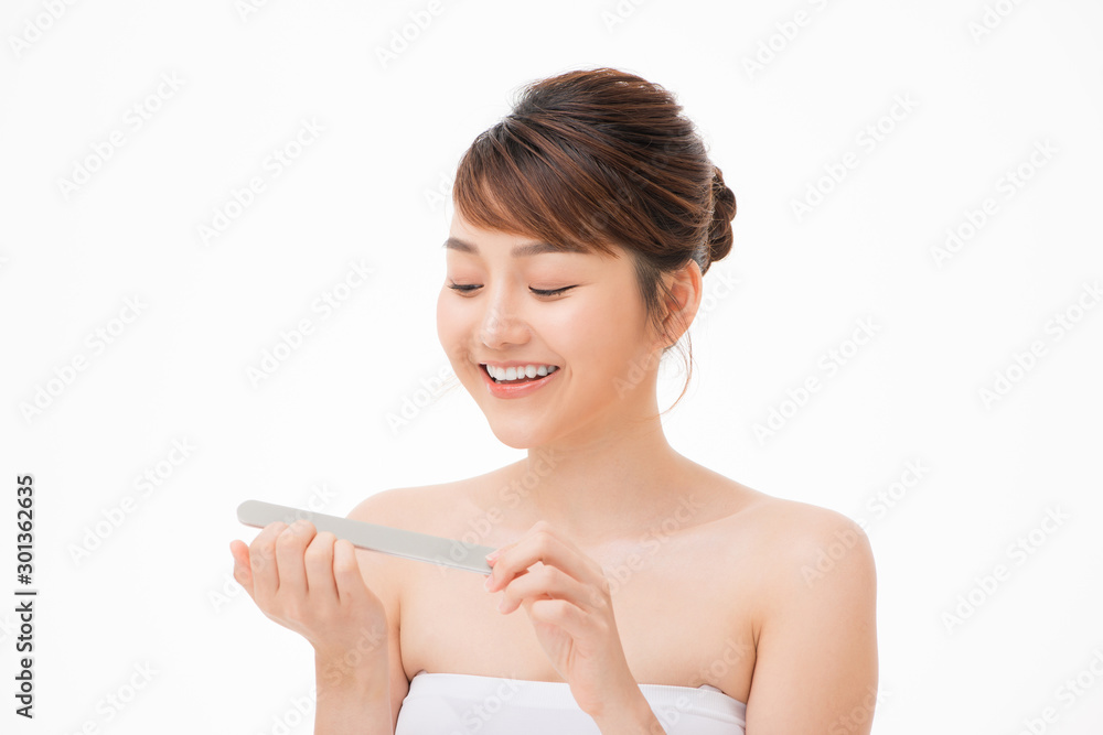 Young attractive asian woman beauty image, Care for nail Young attractive asian woman beauty image, Care for nail