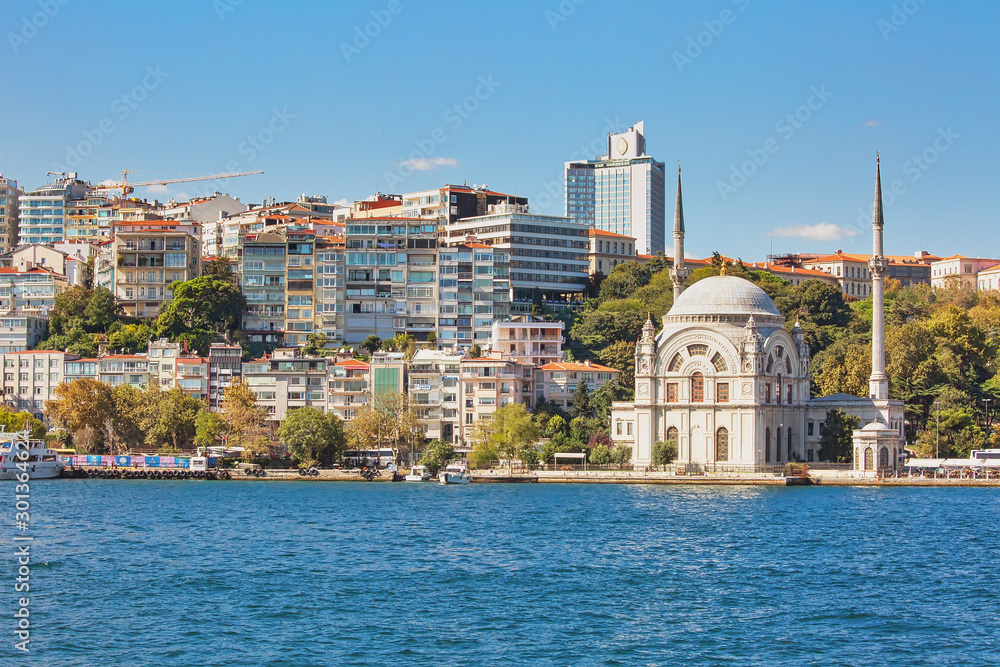 Genuine architecture along the banks of Bosphorus, popular travel destination and significant passway between Europe and Asia. Bosphorus cruise.