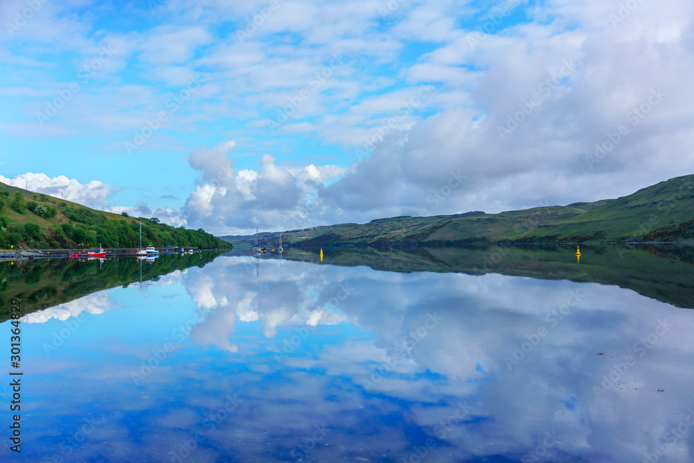 Beautiful Loch Harport in Carbost in the morning with reflection , Isle of Skye , Scotland
