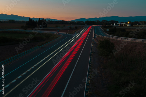 car lights on highway at night