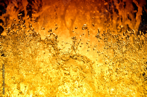 splashing water like flames close up photo