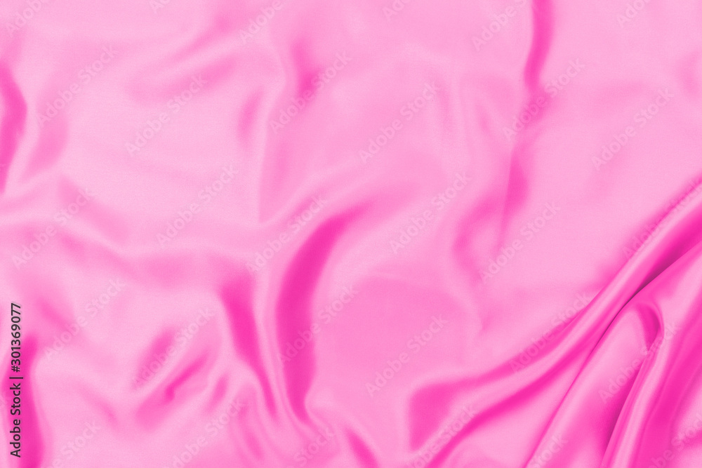 Fototapeta premium Plastic pink satin fabric texture soft blur background