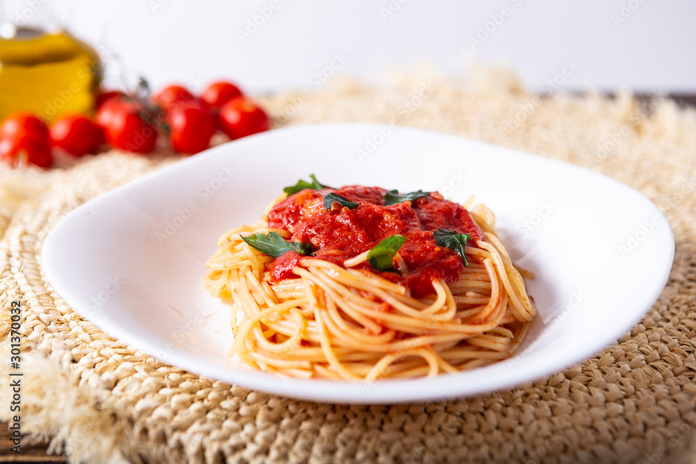 Spaghetti with tomato sauce. Classic dish of Italian tradition. Healthy eating, italian food Spaghetti with tomato sauce. Classic dish of Italian tradition. Healthy eating, italian food