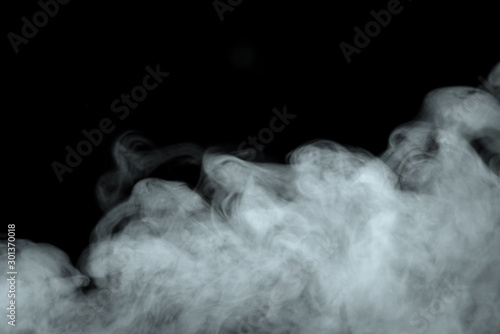 Abstract powder or smoke effect isolated on black background