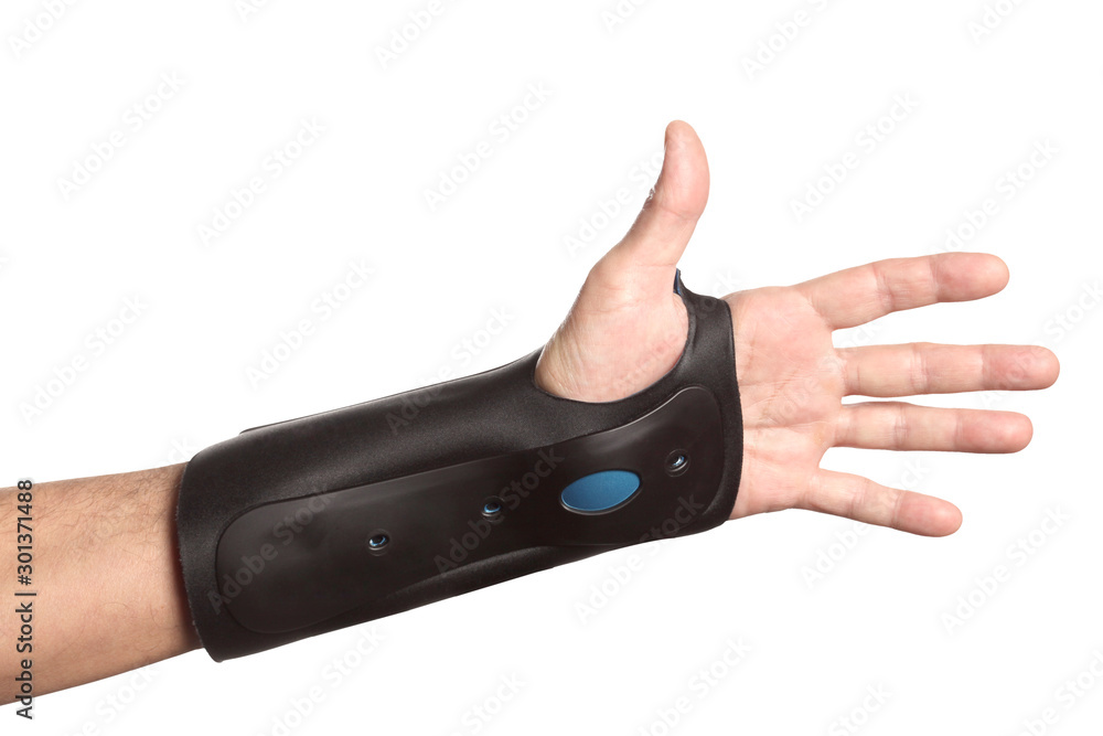 human hand with a wrist brace, orthopedic equipment isolated on white