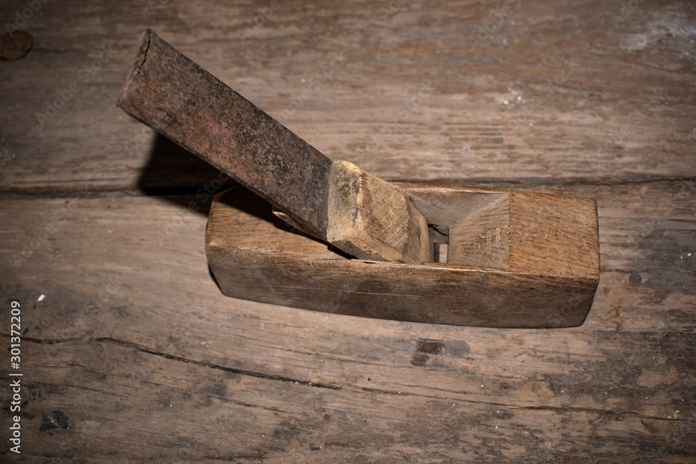 Old carpenter's brush on wooden planks Old carpenter's brush on wooden planks