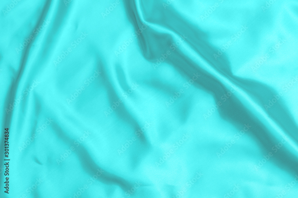 Cyan-Teal satin fabric texture soft background Cyan-Teal satin fabric texture soft background