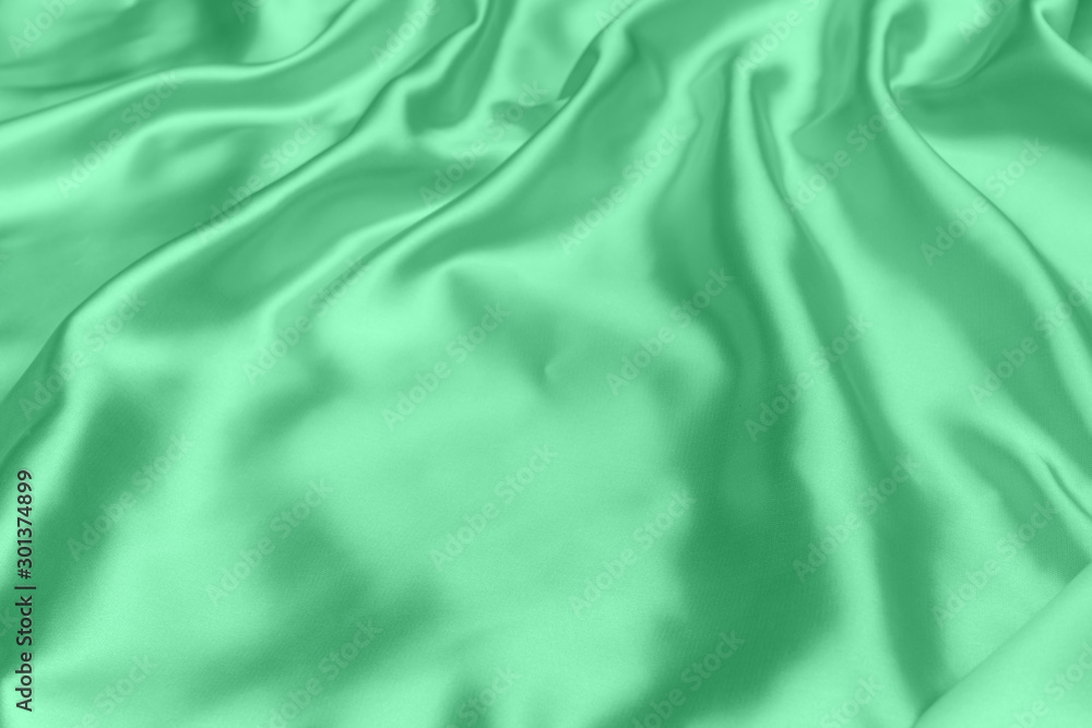 Fototapeta premium green satin fabric texture soft background